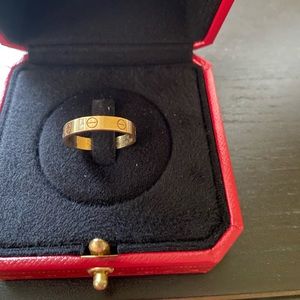 Cartier lightly used love ring size 55. Gold